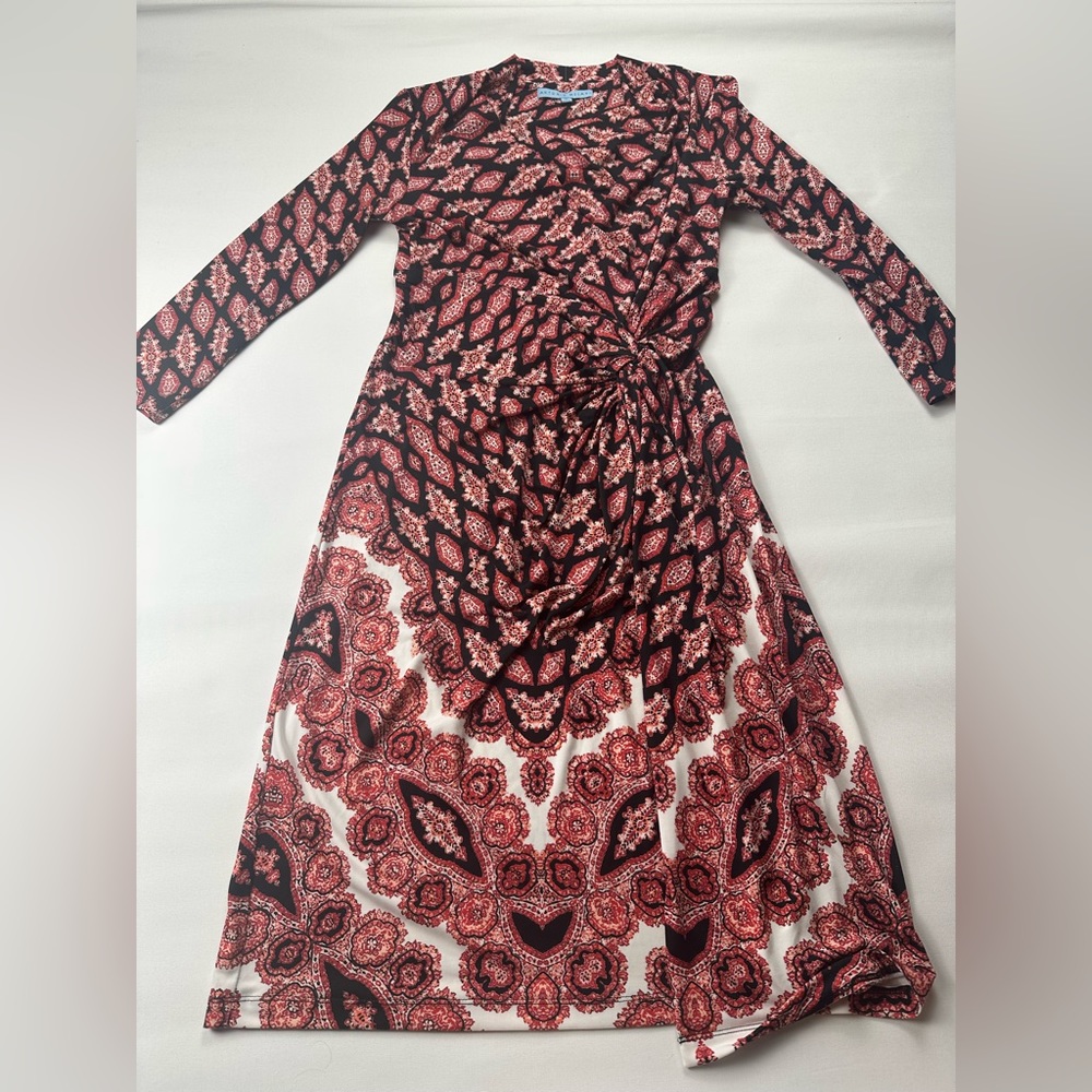 Patterned stretchy dress with faux wrap skirt and cowel neck. Size S